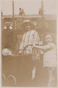 Giant Toy Doll Dolly in Pram Antique Real Photo Postcard