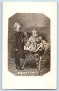 Cute Baby Postcard RPPC Photo Sat On Wicker Chair Peterson Photo Studio c1910's