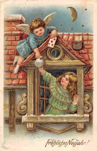 Happy New Year Greeting Cherub Gives Money to Girl 1906 postcard