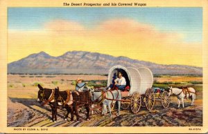 The Desert Prospector and His Covered Wagon Curteich