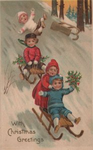 Postcard With Christmas Greetings Children Sledding Down Hill in Snow