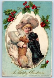 c1910's Christmas Child Girl With Dog Holly Berries Embossed Antique Postcard