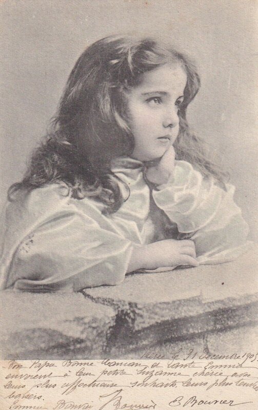 Little brunette girl daydreaming on a fence, PU-1905