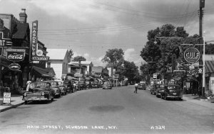 Schroon Lake New York Main Street Coke Sign Greyhound Gulf Real Photo PC AA74649