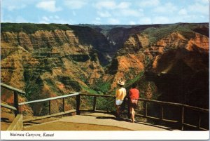 Postcard HI Kauai - Waimea Canyon - tourists looking out over canyon