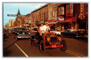 Postcard MI New Car Models On Display Parade Holland Michigan Signs Storefronts