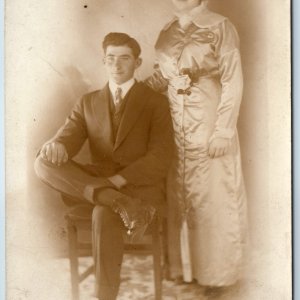 c1910s Young Couple RPPC Handsome Man Woman, Girl Real Photo Card Siblings? A212