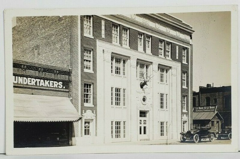 RPPC Elks Bldg & Undertaker POCATELLO IDAHO and De Loux Contractors Postcard P9