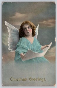 Holiday~Girl Cupid In Blue Christmas Greeting~Vintage Postcard
