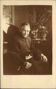 Old Woman in Chair House Cat on Lap c1910 Real Photo Postcard