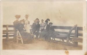 WASHINGTON TO TRIVOLI ILLINOIS REAL PHOTO POSTCARD c1900s FAMILY ON BOAT DOCK