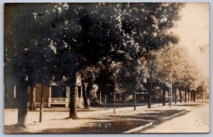 K51/ Charlotte Michigan RPPC Postcard c1910 Main Street Homes 85