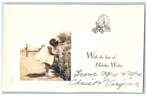 Christmas Postcard RPPC Photo Little Girl Picking Flowers c1905 Unposted Antique