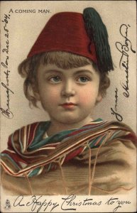 Tuck Christmas Ser 8099 Young Boy in Fez c1905 Vintage Postcard