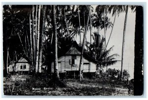 c1930's Scene of Tall Trees and Malay Houses Near Beach Malaysia Postcard
