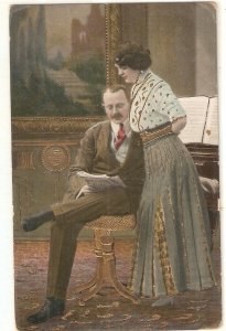 German couple. Reading the News Old vintage German postcard