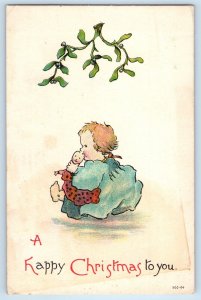 1913 Christmas Little Girl With Doll Under Mistletoe Brooklyn NY Posted Postcard