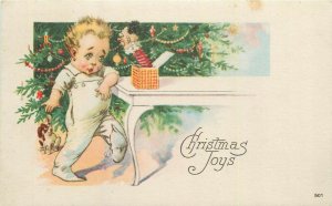 Christmas toys scarry harlequin box baby boy caricature 1922 postcard