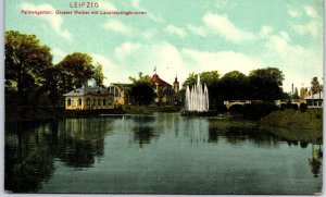 VINTAGE POSTCARD LARGE POND WITH ILLUMINATED FOUNTAIN AT LEIPZIG GERMANY c. 1910