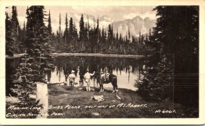 Postcard MT Glacier National Park Marion Lake Swiss Peaks Horse Riders 1934 V195