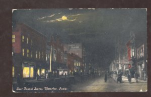 WATERLOO IOWA DOWNTOWN STREET SCENE AT NIGHT FULL MOON VINTAGE POSTCARD