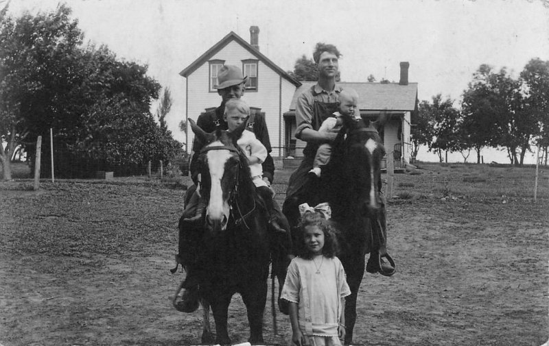 RPPC, FAMILY PICTURE  Men & Boys On Horses~Little Girl~House  1907-1929 Postcard