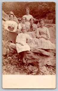 Postcard Victorian Young Women Seated on A Rock, Sisters , Family RPPC c1900