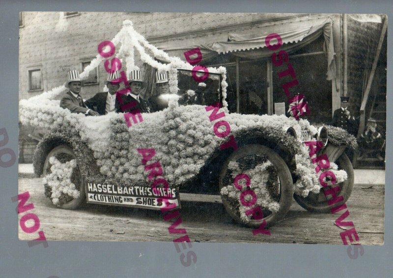 International Falls MINNESOTA RPPC c1910 PARADE FLOAT Car HASSELBARTH CLOTHING