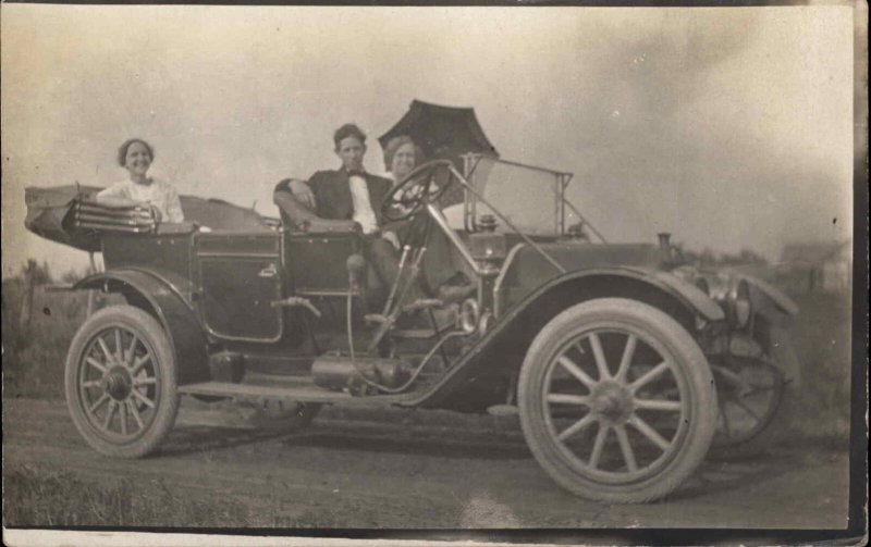 Dapper Young Man and Two Women in Early Classic Car c1910 RPPC PC