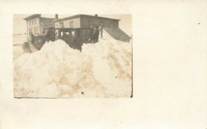 Greenville Me Snow Banking Plow Near Two Buildings Real Photo Postcard