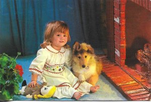 Little girl with her dog and toys Modern Spanish photo postcard 12970s