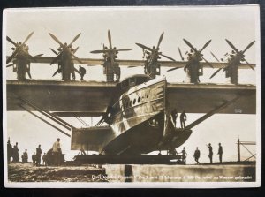 Mint Dornier DOX Giant Seaplane Real Picture Postcard brought to the water