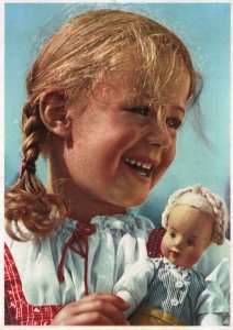 CONTINENTAL SIZE POSTCARD GIRL WITH DOLL ON SOFT PAPER DATED 1949 (E. EUROPE)