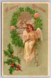 Christmas~Angel Sits In Pink Clover Wreath Holding Bells~Town~Holly~BW 297~c1910