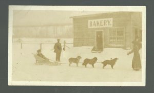 Hazelton B.C. CANADA RP c1910 DOG SLED Main Street BAKERY Winter nr Kitwanga #1