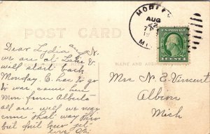 Real Photo Postcard Street View of Breckenridge, Michigan