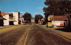 Ten Sleep Wyoming Main Street Coors Beer Sign Mobil Gas Postcard AA29733