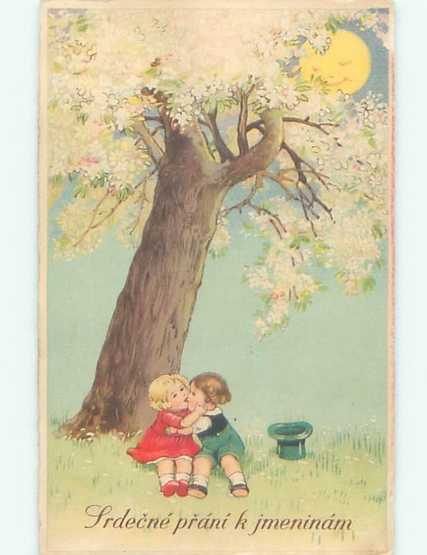 foreign c1910 EUROPEAN GIRL AND BOY KISSING UNDER FLOWERING TREE AC2017