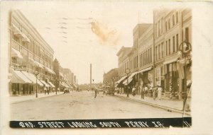Postcard RPPC 1912 Iowa Perry 2nd Street looking South autos 23-12082