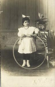 Young Spanish Girl in Dress with Hula Hoop Toy (1910s) RPPC