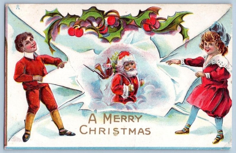 1910's CHILDREN UNWRAP SANTA CLAUS MERRY CHRISTMAS EMBOSSED ANTIQUE POSTCARD