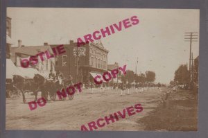 Huron SOUTH DAKOTA RPPC 1910 FIRE DEPARTMENT Parade FIREMEN MARCHING Wagon SD