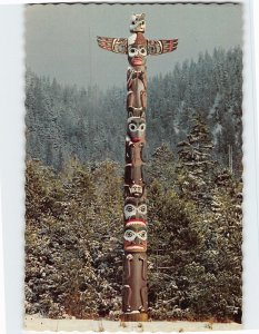 Postcard One of several Indian-carved totem poles in Saxman Park, Ketchikan, AK