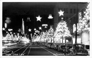 Postcard RPPC 1940s California Hollywood Santa Claus Lane Night Lights CA24-2966