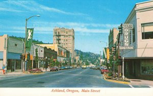 Ashland OR Main Street Drug Store Fronts Old Cars Postcard