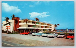 Roadside~Daytona Beach Florida~Castaway Beach Motel~Cars~Palms~1950s Postcard