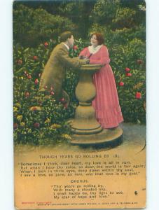 Bamforth comic COUPLE AT BIRDBATH IN GARDEN k8207