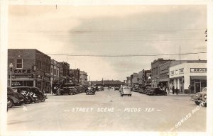 H23/ Pecos Texas RPPC Postcard c30s Street Drug Store Autos Railroad Depot