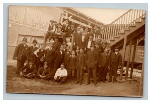 Vintage 1920's  RPPC Postcard Railroad Workers Group Photo & Rail Station