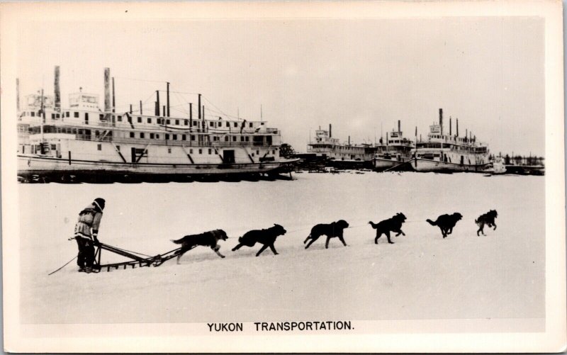 Real Photo Postcard Yukon Transportation Sled Dog Team, Boats